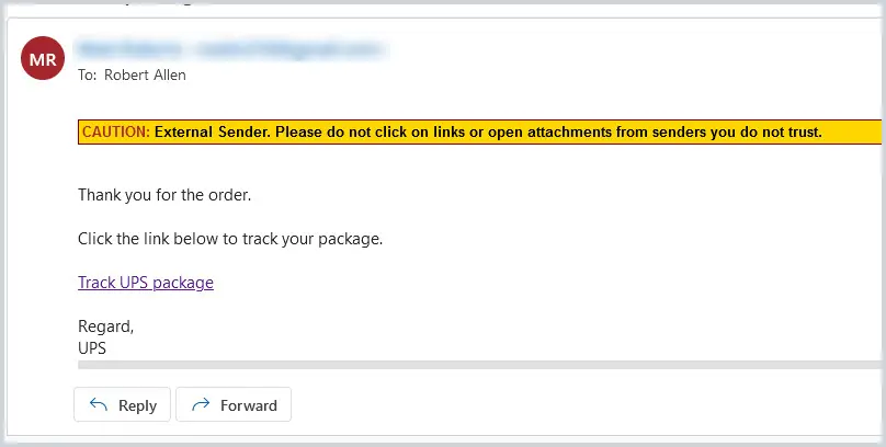 Received email showing the caution disclaimer displayed above the message body