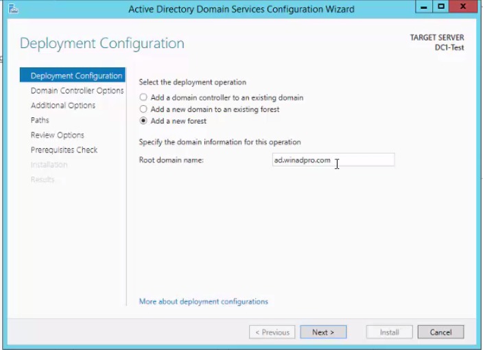 Deployment configuration page with Add a new forest and the root domain name entered