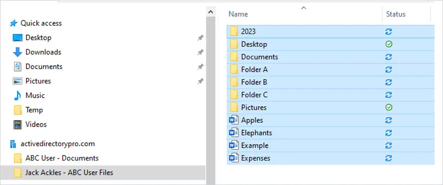 Pasted files in the synced folder showing the blue syncing status icons
