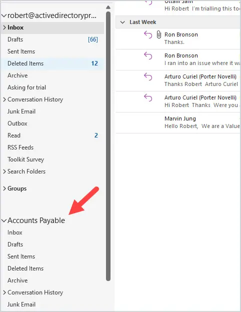 Outlook desktop folder pane with the shared mailbox listed below the user's own mailbox